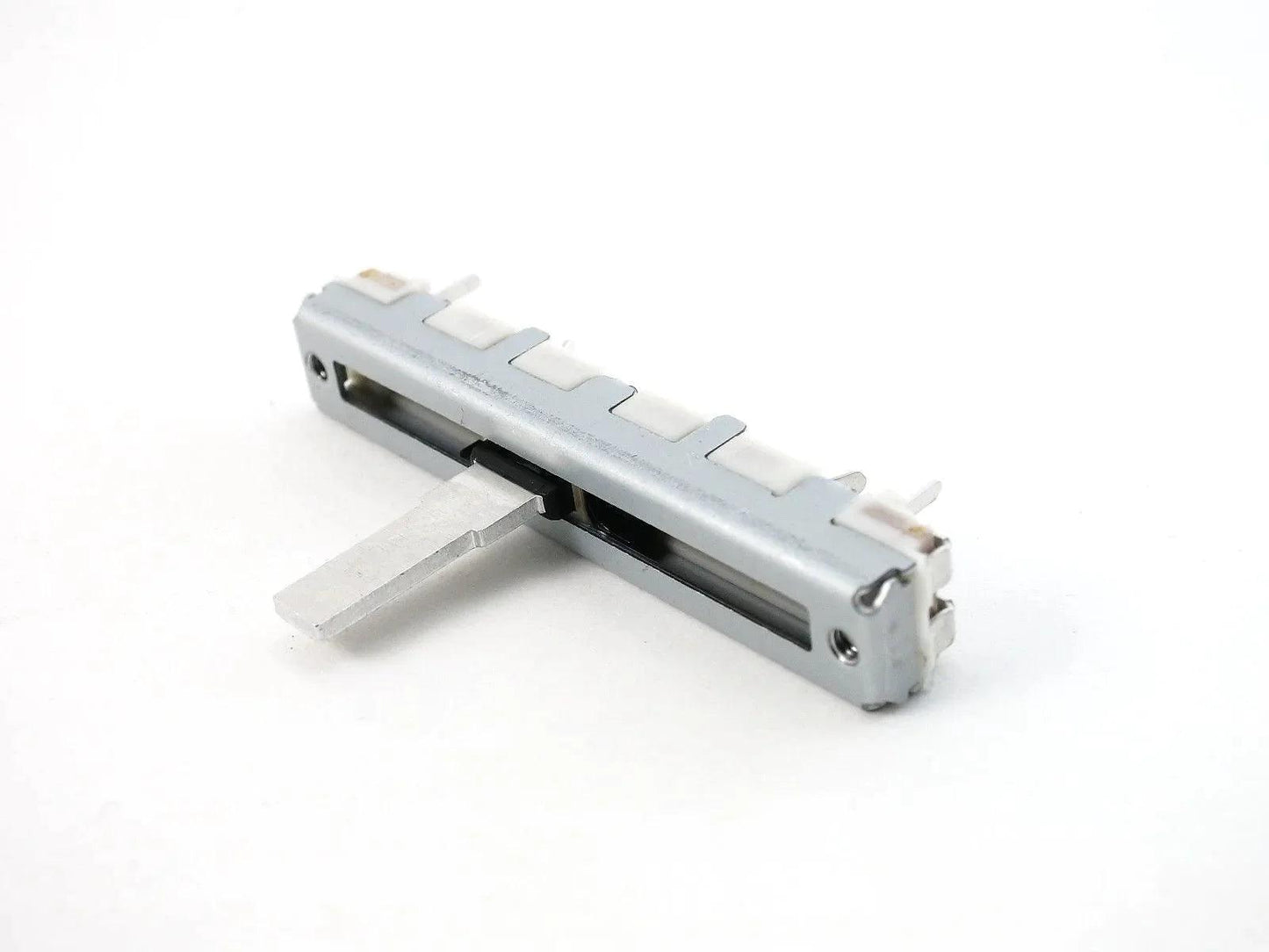 Casio CZ-101 slide potentiometer synthesizer part with metal slider and white adjustment tabs