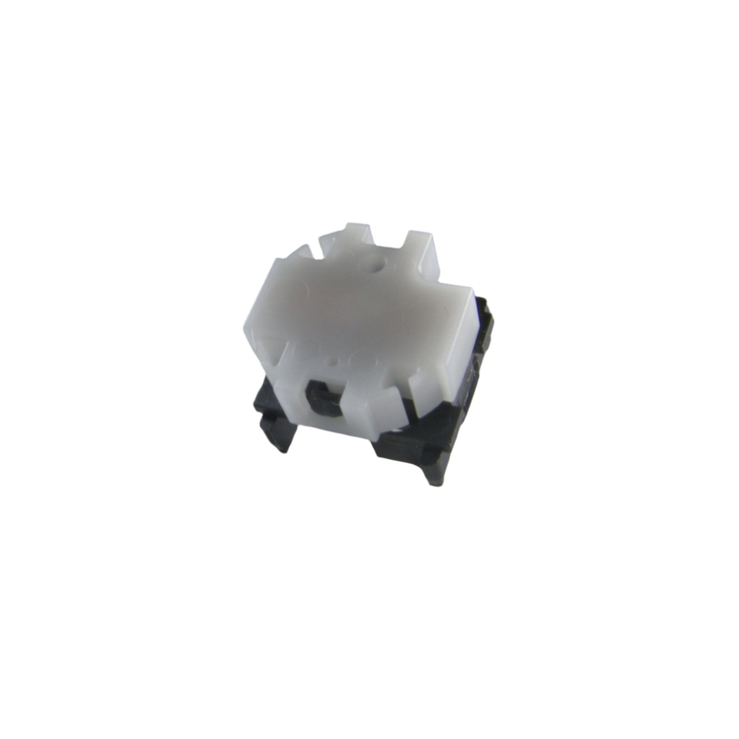 Close-up of an E-MU E-Synth white pushbutton switch component on a white background