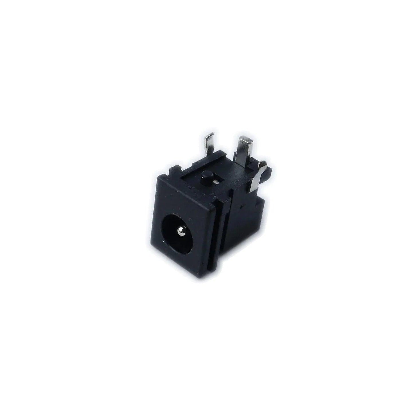 Close-up of black power input jack for Korg MicroKorg synthesizer with metal connectors