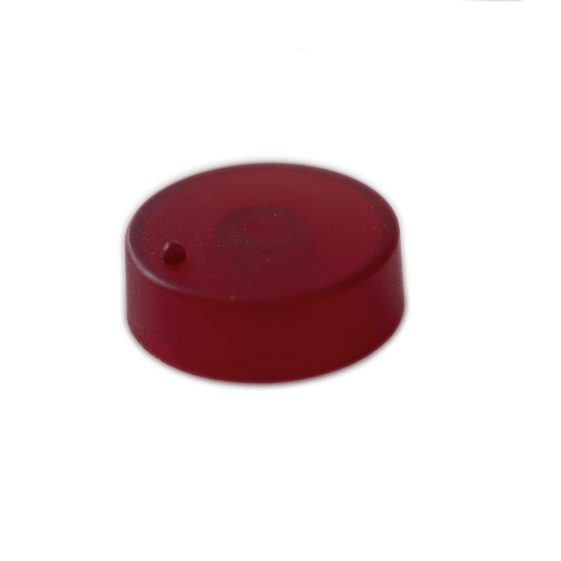 The Waldorf nw1 features a dark red knob with a small protruding dot on one side, boasting a semi-transparent finish, placed on a white background.