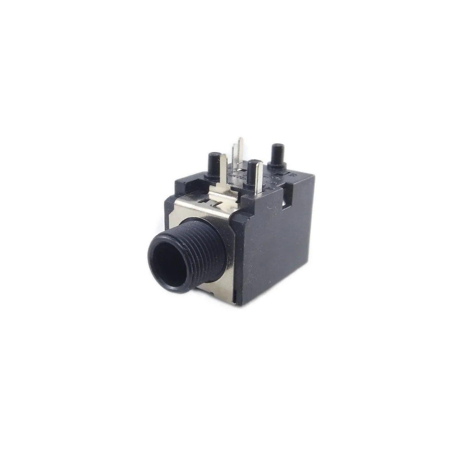 Close-up of a black stereo phone jack socket with metal terminals on a white background