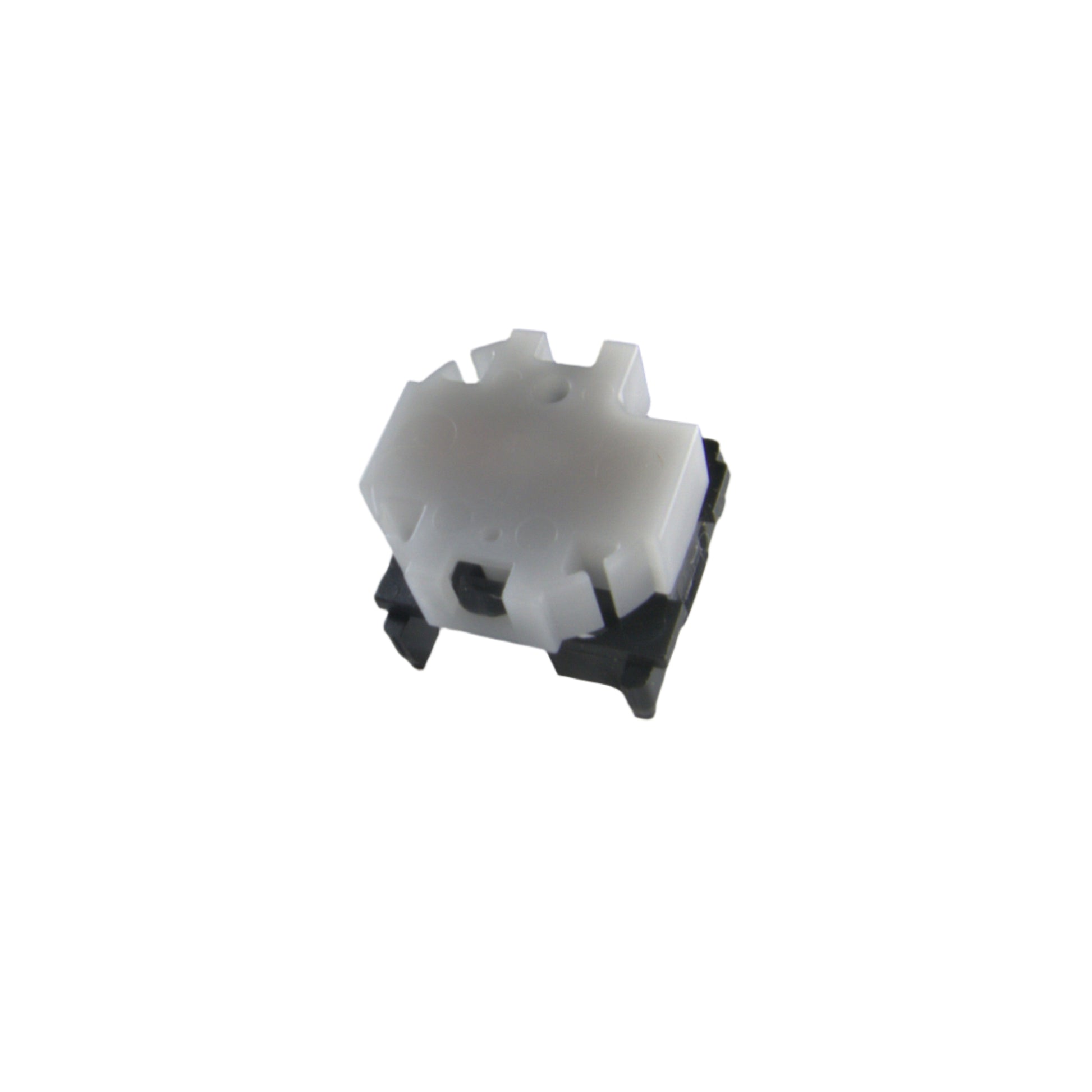 Close-up of an E-MU E-Synth white pushbutton switch component on a white background