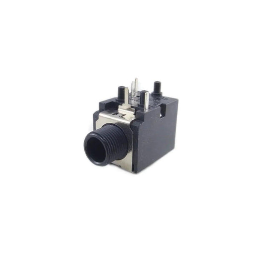Close-up of black stereo phone jack connector part with metal contacts on white background