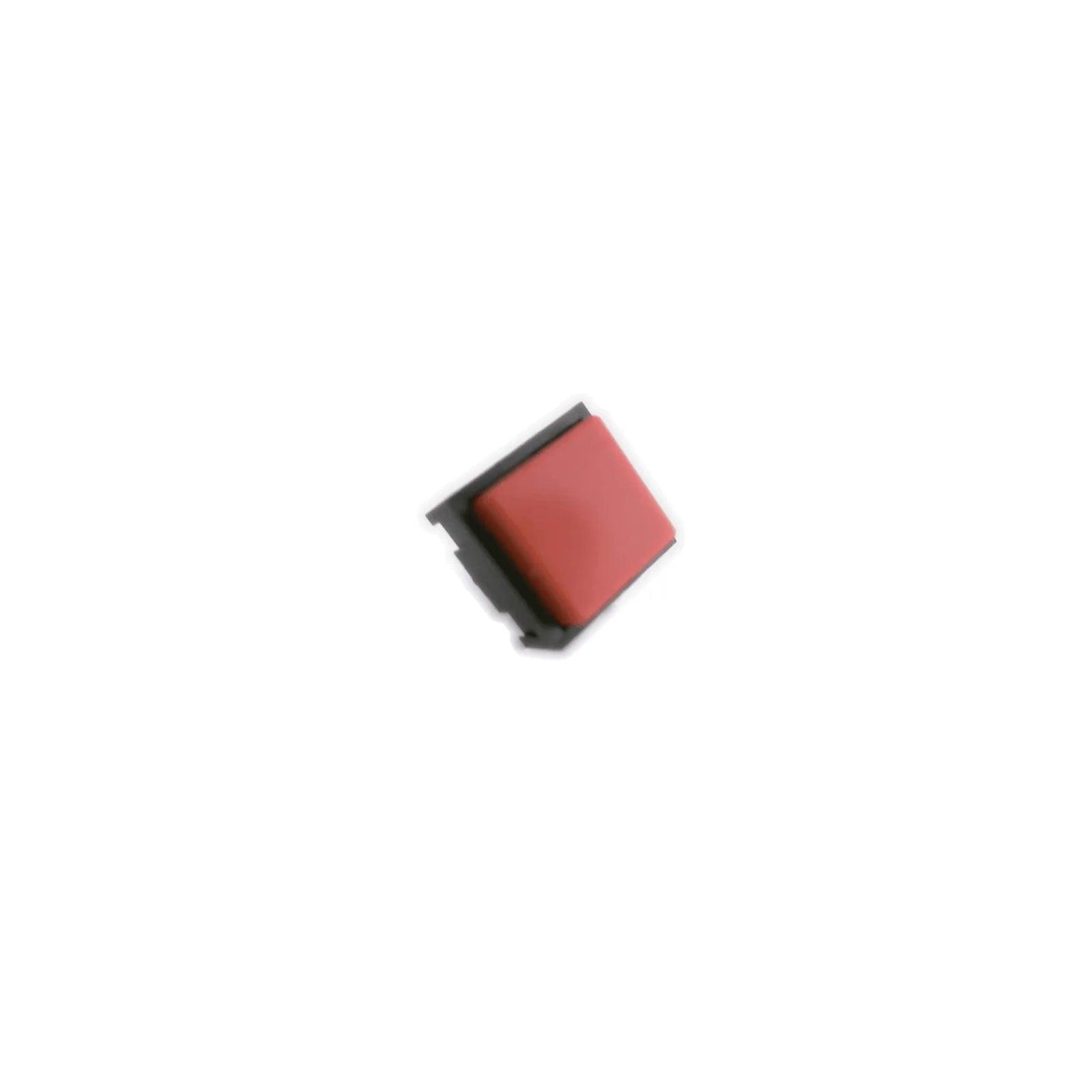 Red square pushbutton switch component for synthesizer parts on white background