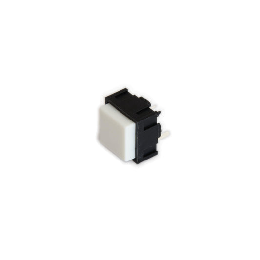 White pushbutton switch with black plastic housing for synthesizer parts on white background