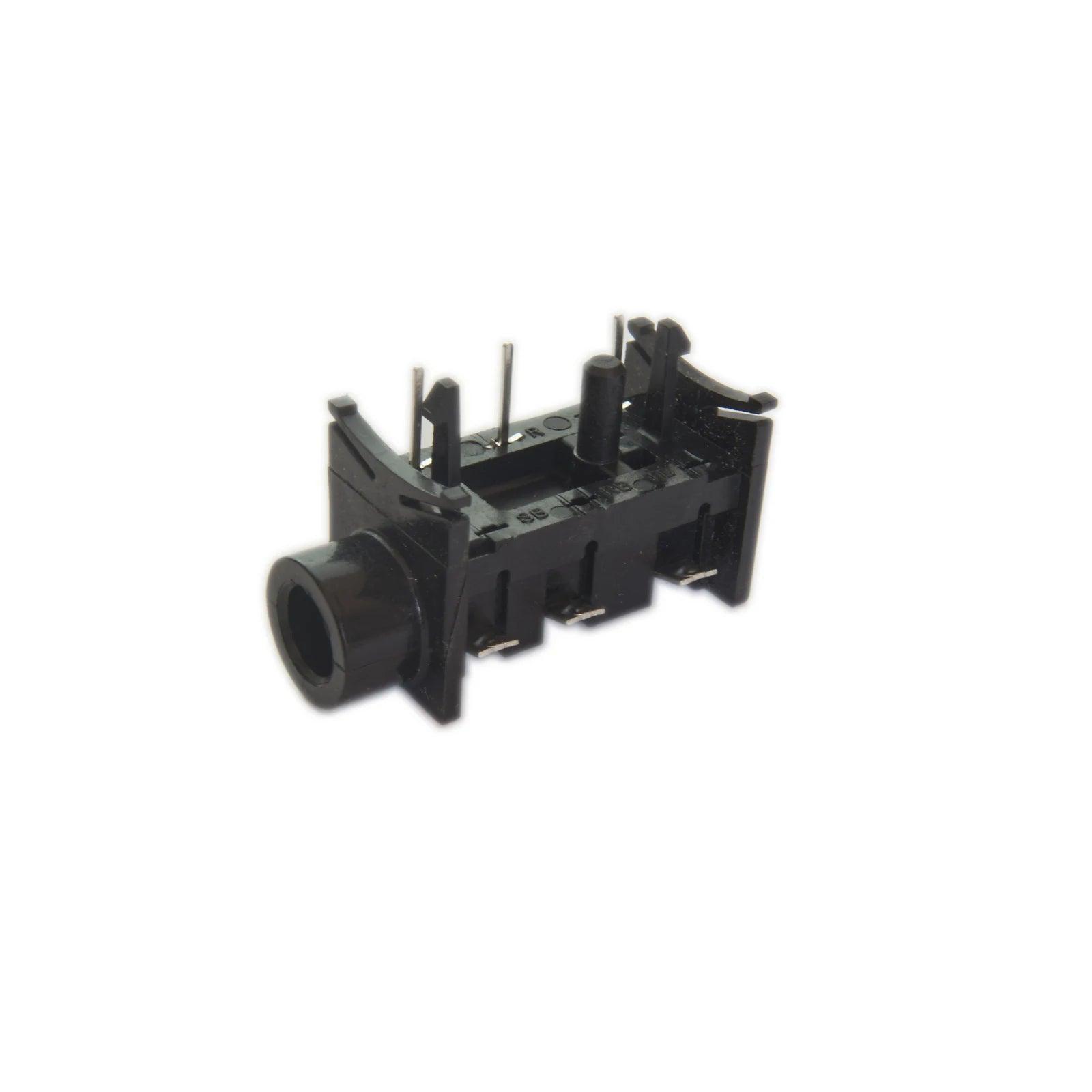Black E-Mu Ultra Proteus synthesizer jack socket part isolated on white background