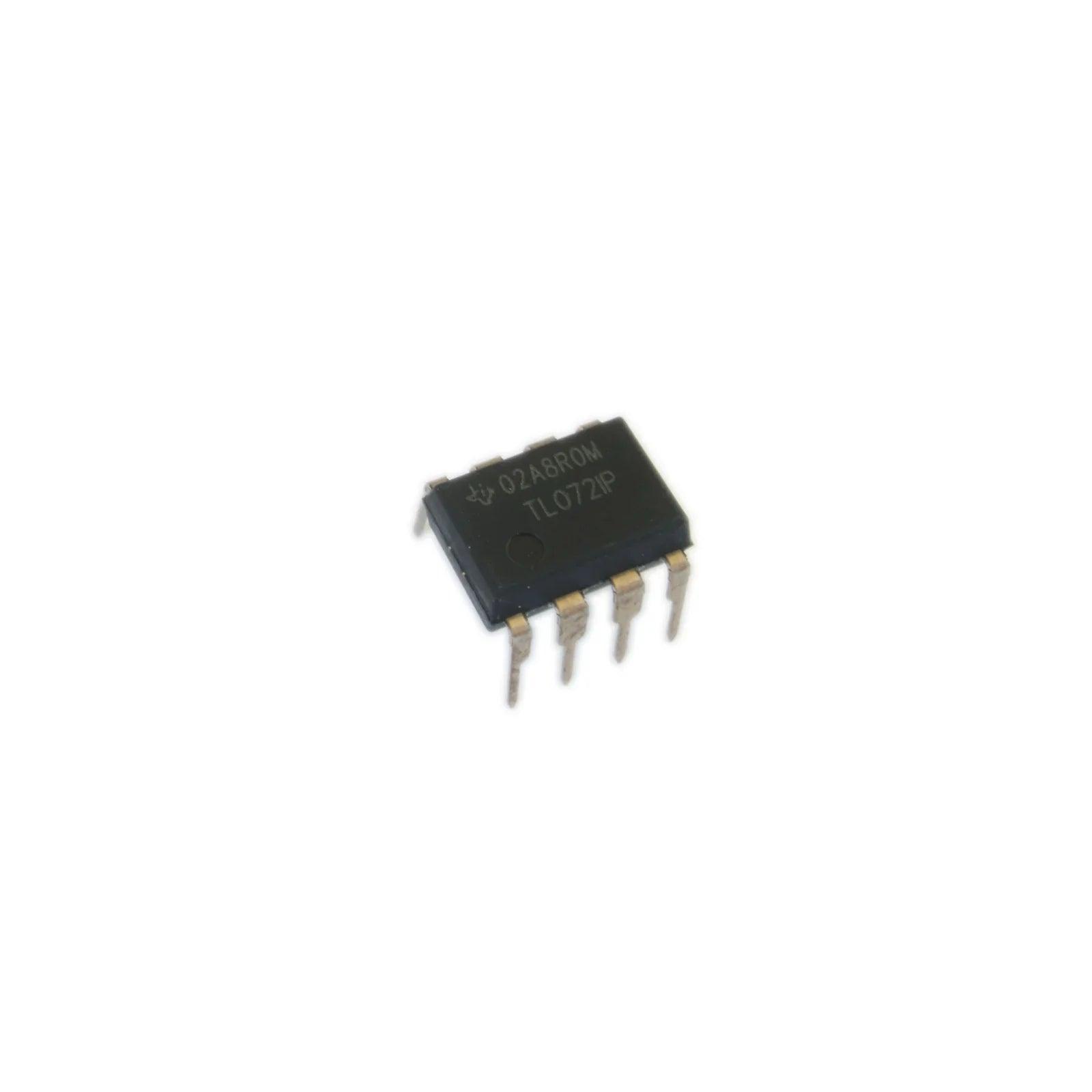 Close-up of TL072IP integrated circuit chip with visible pins on white background