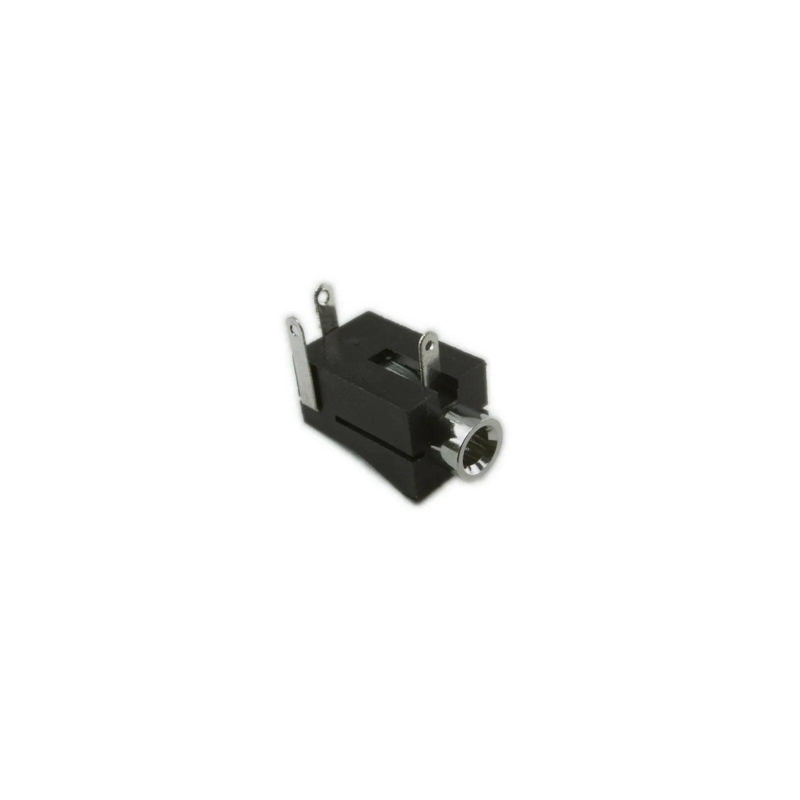 Close-up of a black DC power jack with metal connectors for Moog Rogue synthesizer