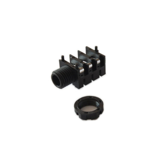 Black iridium phone jack connector with threaded ring on white background
