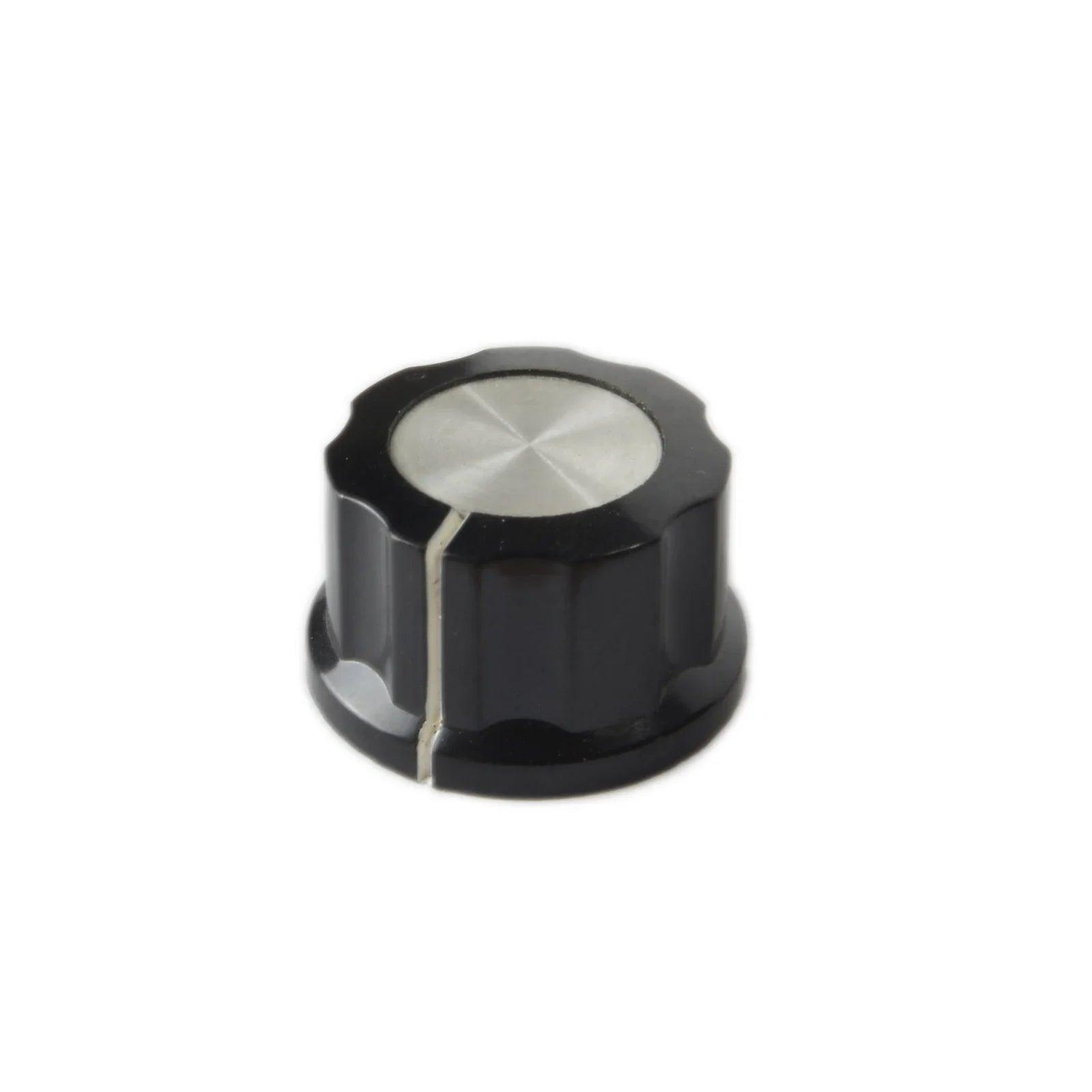 Black knob with metallic silver top and white indicator line, synthesizer replacement part